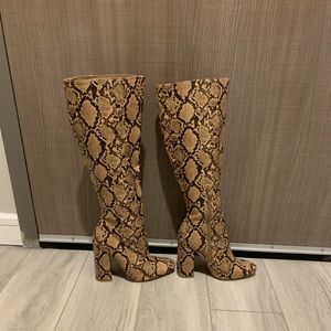 Snake skin knee high heel boots